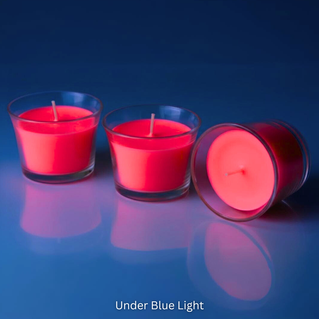Three tealight candles on a reflective blue surface with Under Blue UV Light
Sensations Unleashed BDSM UV Wax Play Tea Light Candle In India - Set of 3